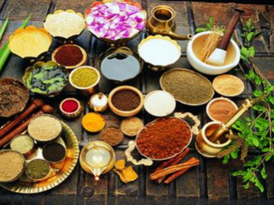 Ayurvedic Herbs In Traditional Bowls